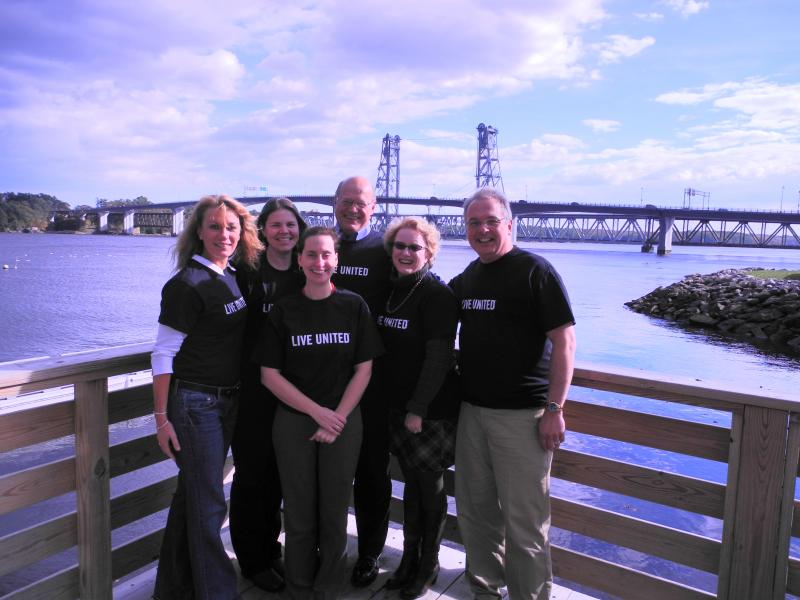 Fall United Way Campaign drawing to a close. “Loaned Executives” join United Way of Mid Coast Maine staff and volunteers in the fall to provide information on community needs and services, deliver individual and workplace solicitations, and help the community reach its $1,930,000 goal. The Sagadahoc Bridge in the background has been nicknamed the “Harriet Bridge” by the campaign assistants, in honor of the 93-year-old woman featured in this year’s video (www.uwmcm.org) who used to walk across the bridge bef